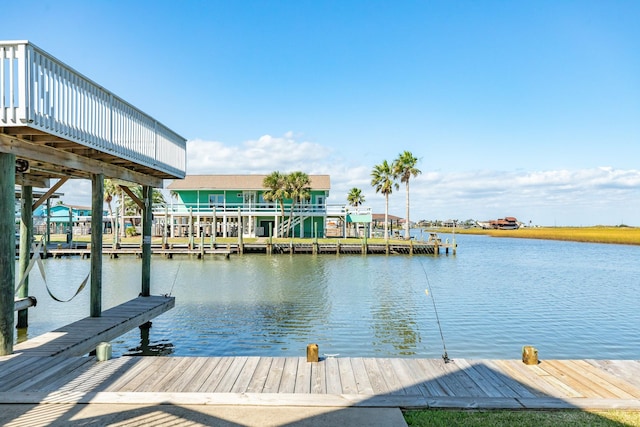 view of dock with a water view