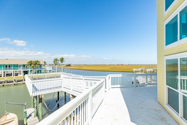 dock area with a deck with water view