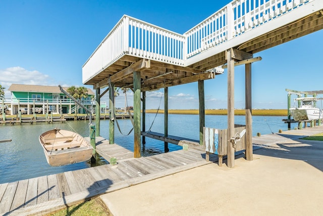 dock area with a water view