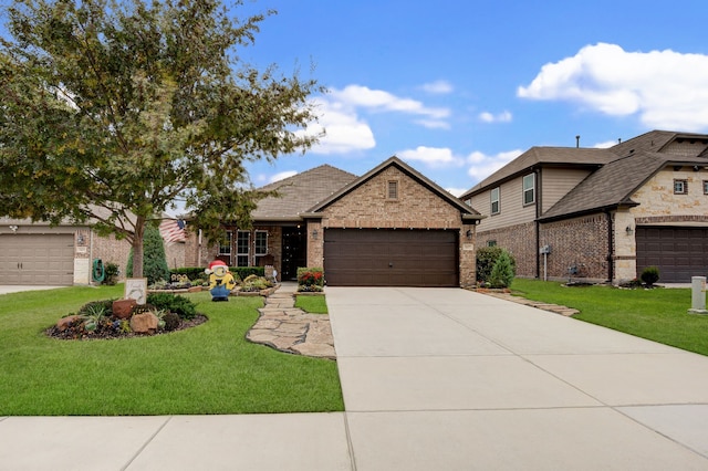 view of front facade with a front lawn and a garage