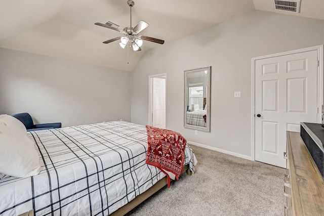 bedroom featuring vaulted ceiling, ceiling fan, and carpet