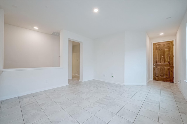 view of tiled spare room