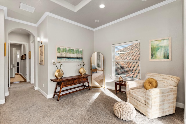 sitting room with carpet and ornamental molding