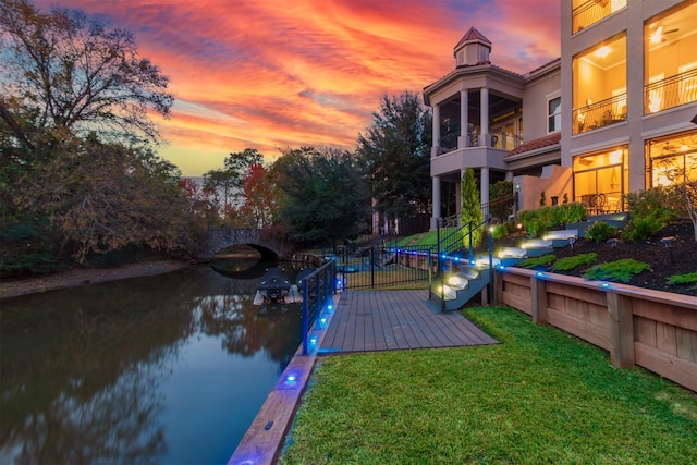 dock area featuring a yard and a balcony