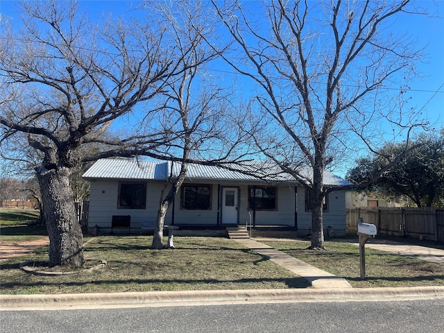 ranch-style house with a front yard