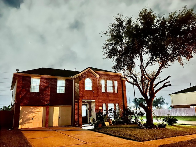 front facade with a garage