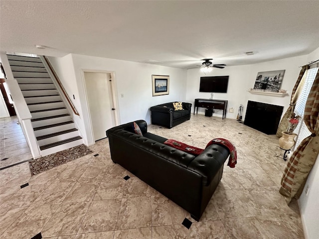 living room featuring ceiling fan