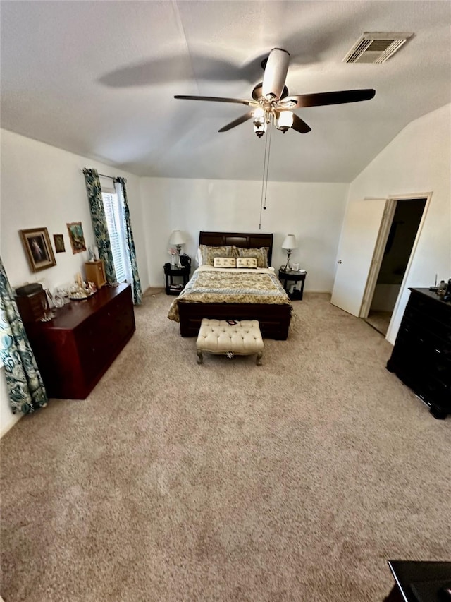 bedroom with light carpet, ceiling fan, and lofted ceiling