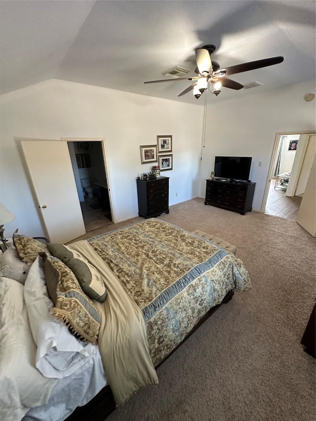 bedroom featuring ceiling fan, carpet floors, and vaulted ceiling