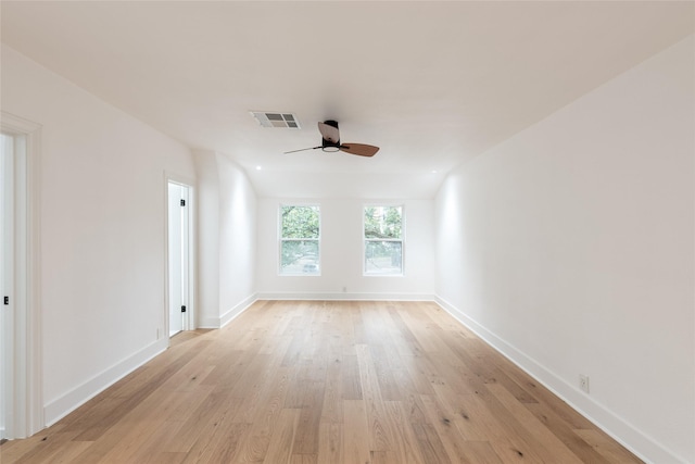 unfurnished room with ceiling fan and light wood-type flooring