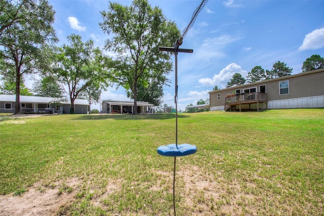 view of yard featuring a deck