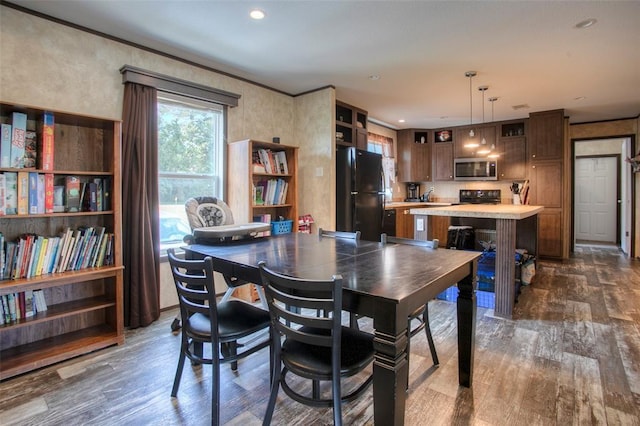 dining area featuring dark hardwood / wood-style floors