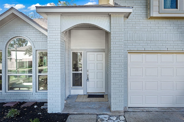 entrance to property featuring a garage