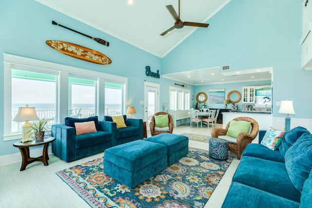 living room with a water view, ceiling fan, light hardwood / wood-style flooring, and high vaulted ceiling