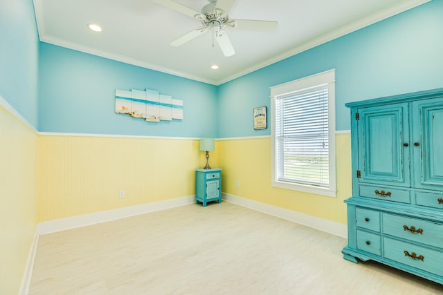 interior space featuring ceiling fan, crown molding, and light hardwood / wood-style flooring