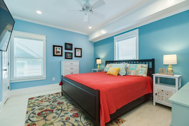 bedroom with light hardwood / wood-style floors, ceiling fan, and crown molding