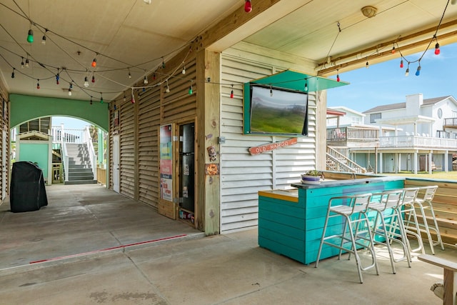 view of patio featuring a bar