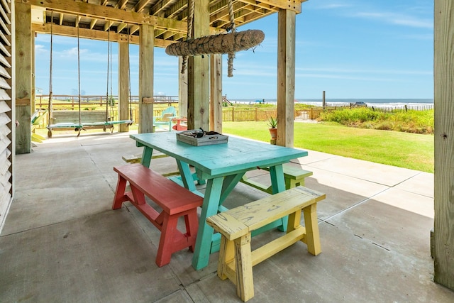 view of patio / terrace featuring a water view