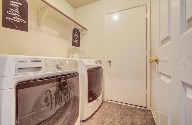 laundry area with washer and clothes dryer