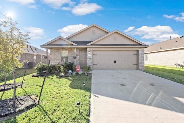 single story home with central AC, a front lawn, and a garage