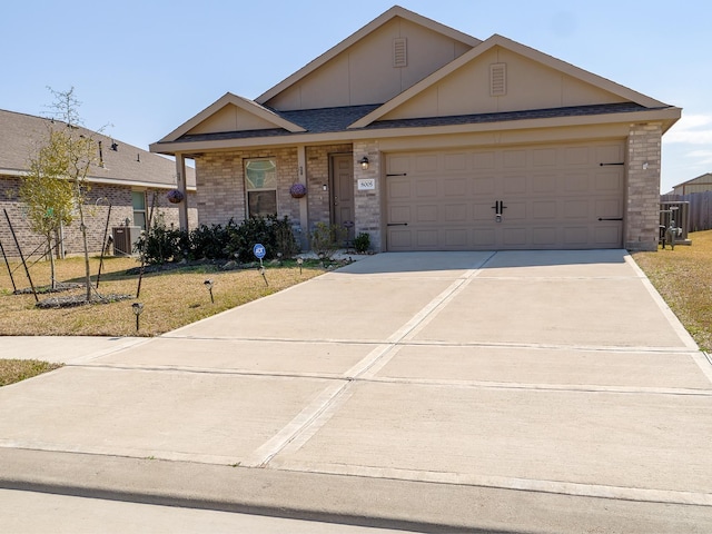 single story home with brick siding, driveway, a front lawn, and a garage