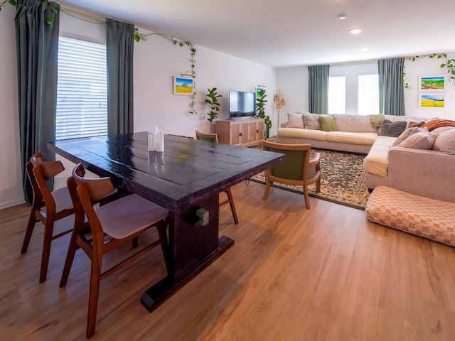 dining area with light wood-type flooring