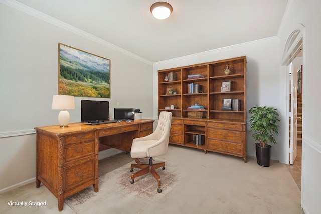 carpeted office space with ornamental molding