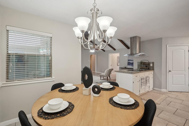 tiled dining space featuring a chandelier and beam ceiling