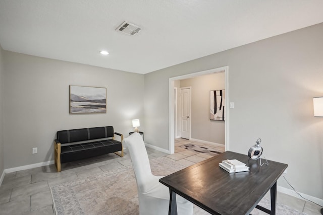 office space with light tile patterned floors