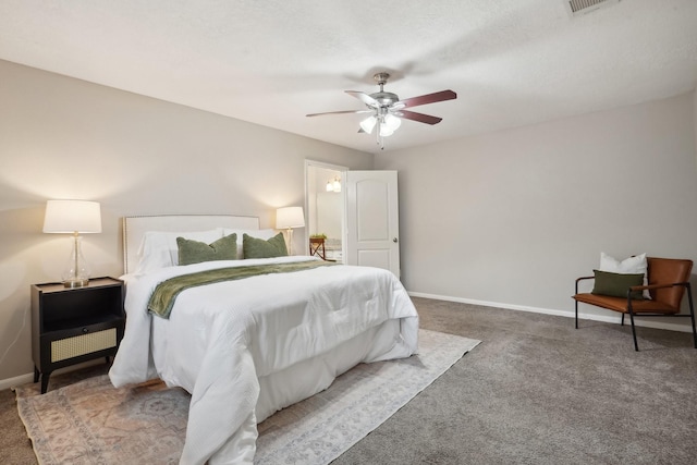 bedroom featuring ceiling fan and carpet floors