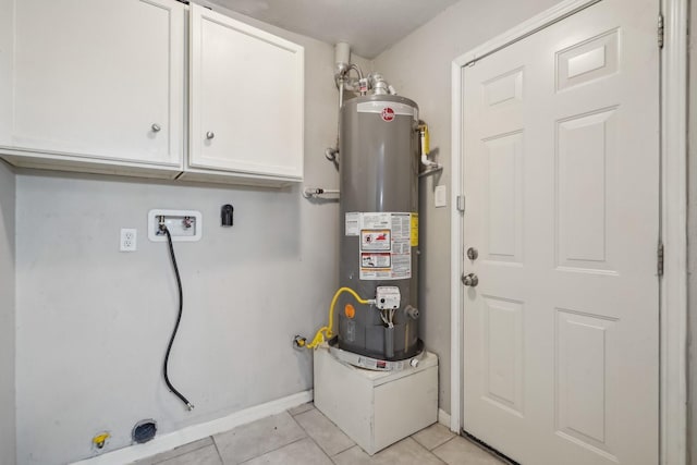 utility room with gas water heater