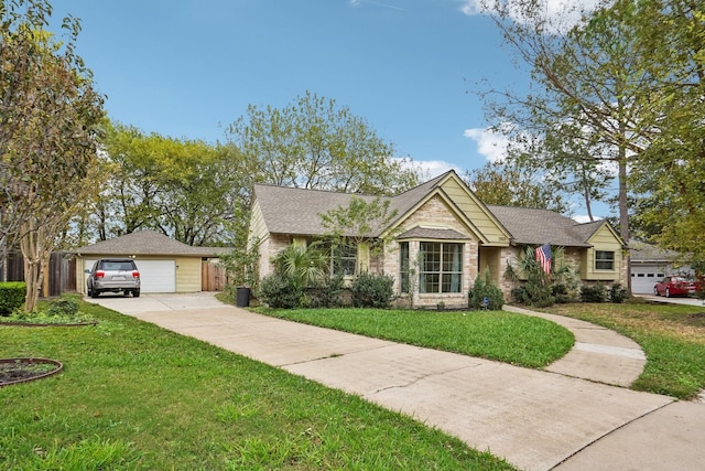 view of front of house with a front yard and a garage