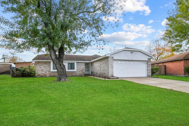 ranch-style house featuring a front yard and a garage