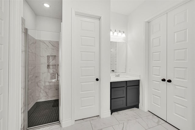 bathroom featuring vanity and walk in shower