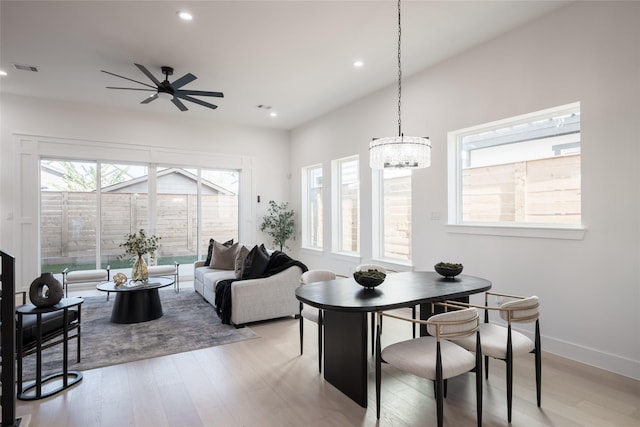 dining room featuring ceiling fan and light wood-type flooring