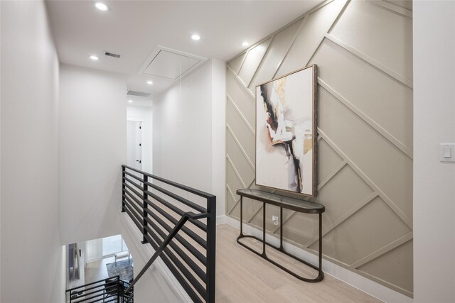 staircase featuring hardwood / wood-style flooring