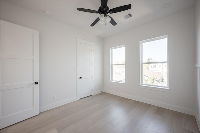 unfurnished bedroom featuring ceiling fan and light hardwood / wood-style floors