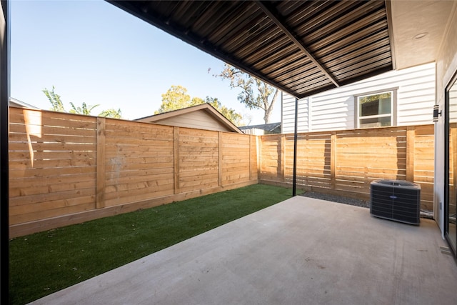 view of patio with central AC unit