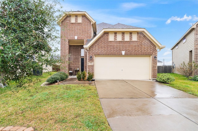 traditional-style home featuring a garage, brick siding, fence, driveway, and a front lawn