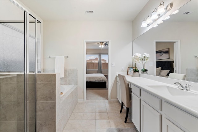 full bathroom featuring tile patterned flooring, visible vents, connected bathroom, and vanity