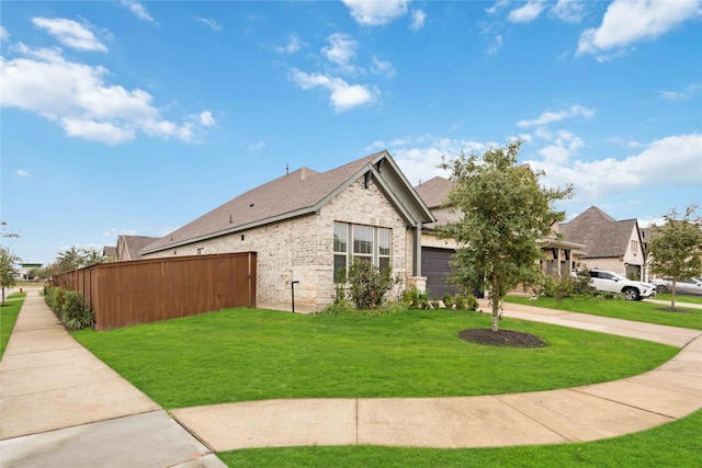 view of property exterior with a yard