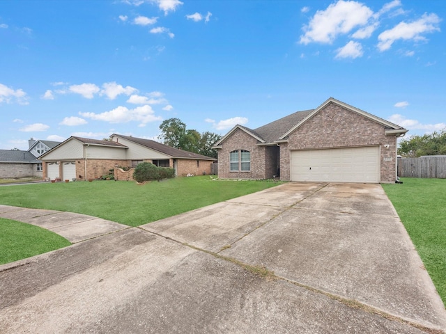 ranch-style home featuring a garage and a front yard