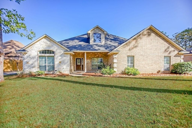 view of front of property with a front lawn