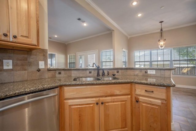 kitchen featuring dishwasher, sink, crown molding, decorative backsplash, and kitchen peninsula