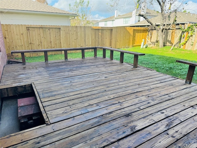 deck featuring a yard