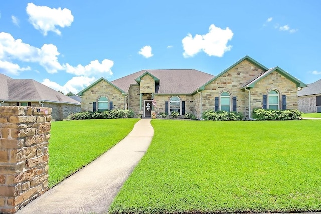 view of front of property with a front lawn