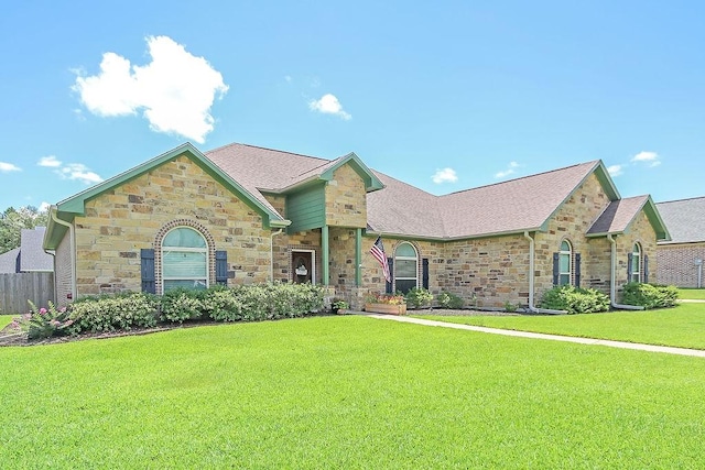 ranch-style home with a front yard