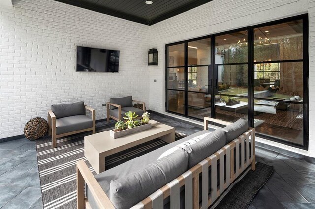 7010 Bowie Ct, Montgomery, TX 77316 - view of patio featuring an outdoor living space