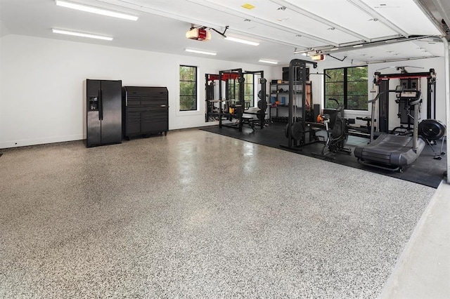 workout area featuring plenty of natural light