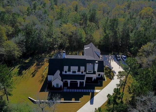 7010 Bowie Ct, Montgomery, TX 77316 - view of property location featuring a heavily wooded area
